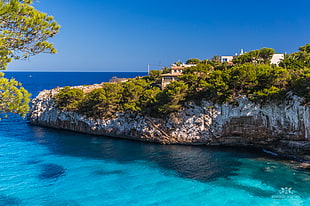 aerial view of house on top of a mountain that is covered with blue sea under the blue sky during daytime, mallorca HD wallpaper