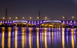 skyline purple bridge under the night sky HD wallpaper