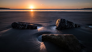 photography of brown sand dunes during sunset, dublin, ireland