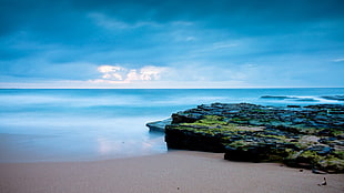 shoreline beside rock, coast, sky, horizon, sea