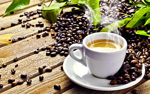 white ceramic cup with coffee