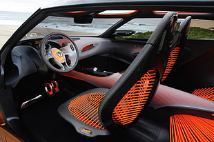 orange and black Renault car steering wheel and car bucket seat set HD wallpaper