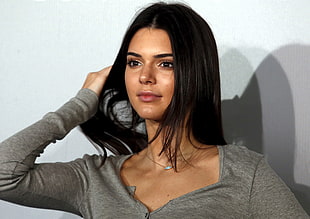 Kendall Jenner wearing gray sweatshirt