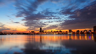 body of water, city, cityscape, clouds, sky