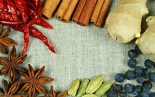 assorted spices on top of grey textile HD wallpaper