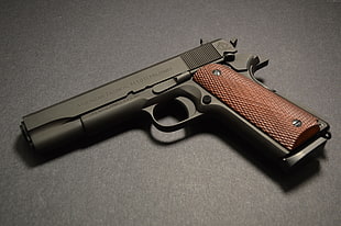black and brown American Tactical M1011 pistol HD wallpaper