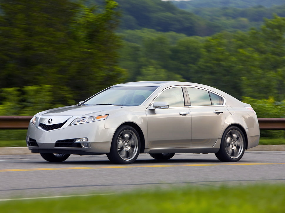 silver Acura TL on black top road HD wallpaper