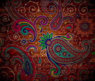 orange blue and green paisley print textile