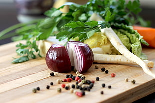 sliced onion with radish, cabbage, and pepper on chopping board HD wallpaper
