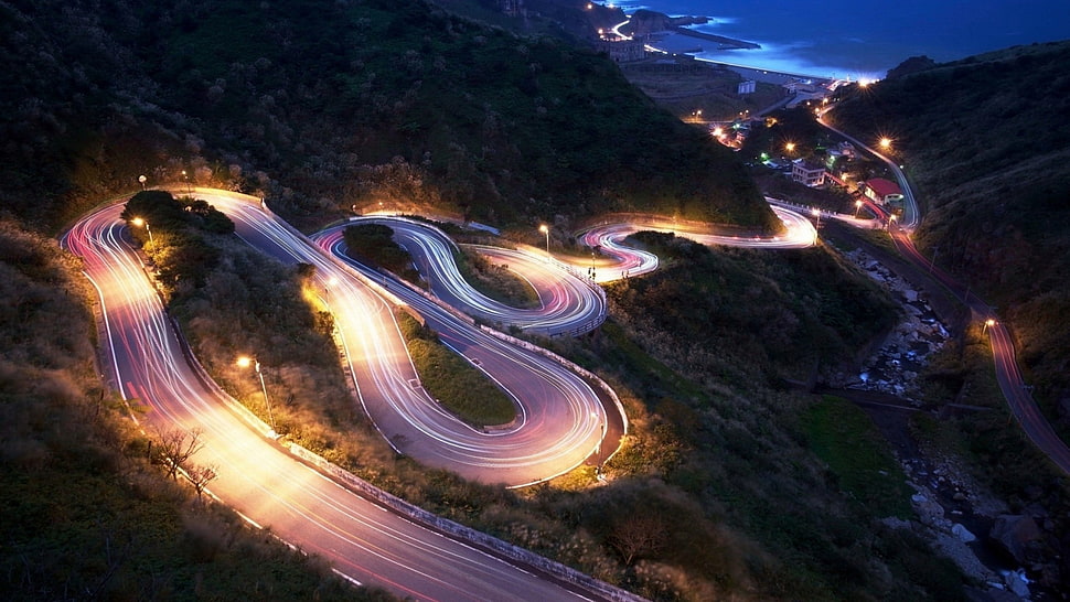 time-lapsed photography of cars on road, road, hairpin turns, landscape, mountains HD wallpaper