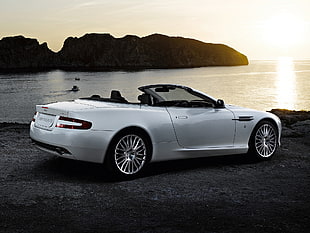 silver convertible coupe on black land during daytime HD wallpaper
