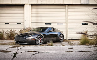 black Mercedes-Benz sedan, Aston Martin Vantage