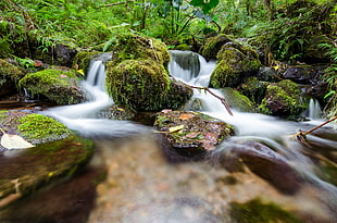 running river photo with rock formations HD wallpaper