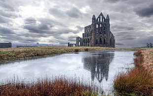 grey concrete building, ruin, reflection, clouds, Whitby Abbey