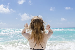 woman wearing bra in front of body of water HD wallpaper