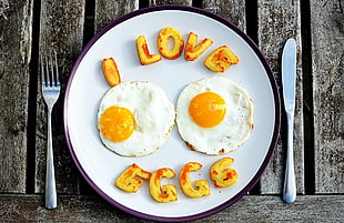 two white Sunny side up and I Love Eggs nuggets on white ceramic plate HD wallpaper