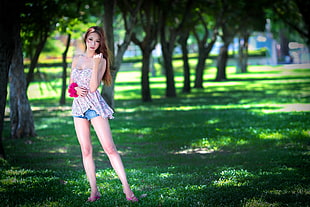 woman wearing blue denim short shorts and pink floral sleeveless mini dress HD wallpaper