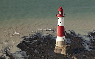 white and red concrete lighthouse near body of water, nature, lighthouse, beach HD wallpaper