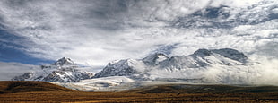 snow mountain under cloudy skies, turkish