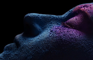 person's face with blue and purple powder in dark room HD wallpaper