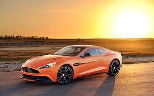 orange sport coupe, car, Aston Martin, sunlight, orange cars HD wallpaper