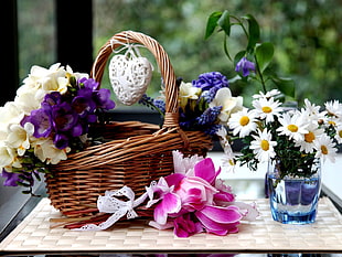 white and purple orchid inside basket on table HD wallpaper