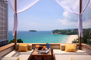 open balcony with couch and coffee table