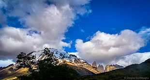 white and brown mountain range under blue sky and white clouds HD wallpaper