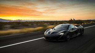 black sports coupe, McLaren P1, car, motion blur, road HD wallpaper