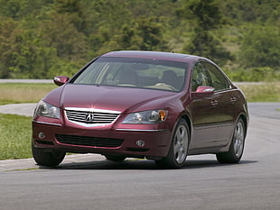 maroon Acura car on pave HD wallpaper