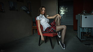 woman wears white and black button-up shirt sit on red leather armless chair HD wallpaper