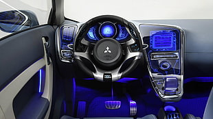 black turned on Mitsubishi car interior with blue lights HD wallpaper