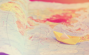 yellow paper boat on map HD wallpaper