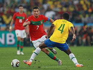 two person playing soccer