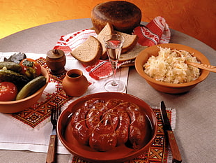 cooked meat on red bowl