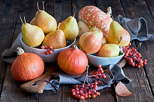 assorted-color fruit on bowls