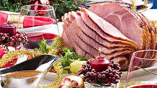 slice ham near red pillar candle and sauce closeup photography HD wallpaper