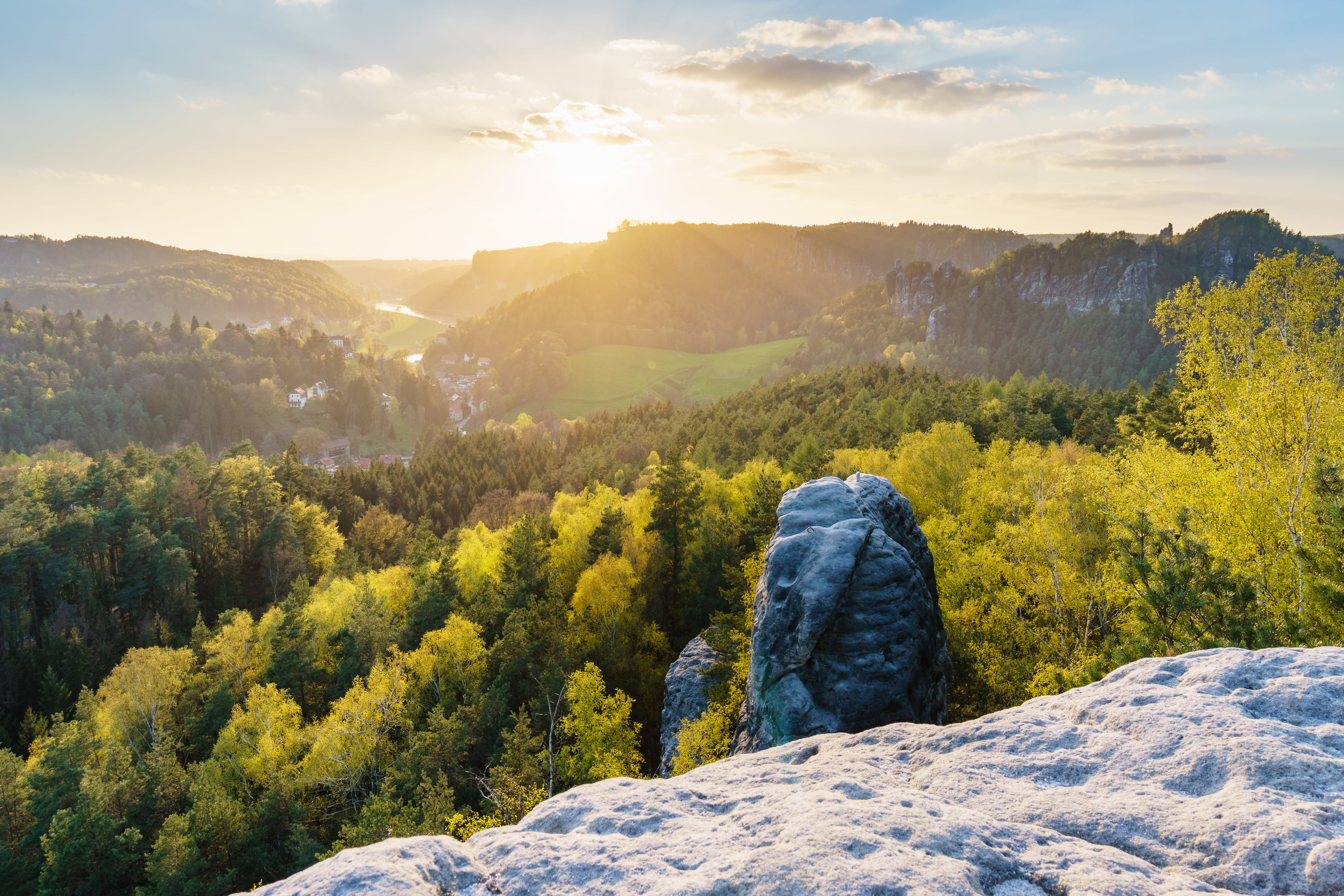 rock mountain near trees