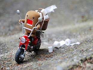 Domo riding motorcycle toy, humor, motorcycle, toys, toilet paper