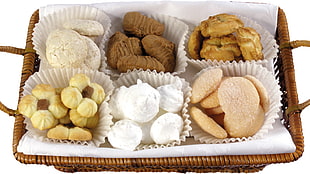 white and brown assorted cookies on top of brown woven basket HD wallpaper