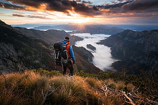 man standing in front of mountains, nature, photography, landscape, hiking HD wallpaper