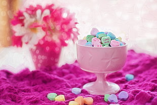 white footed cup with heart decor