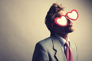 man wearing red heart novelty sunglasses HD wallpaper