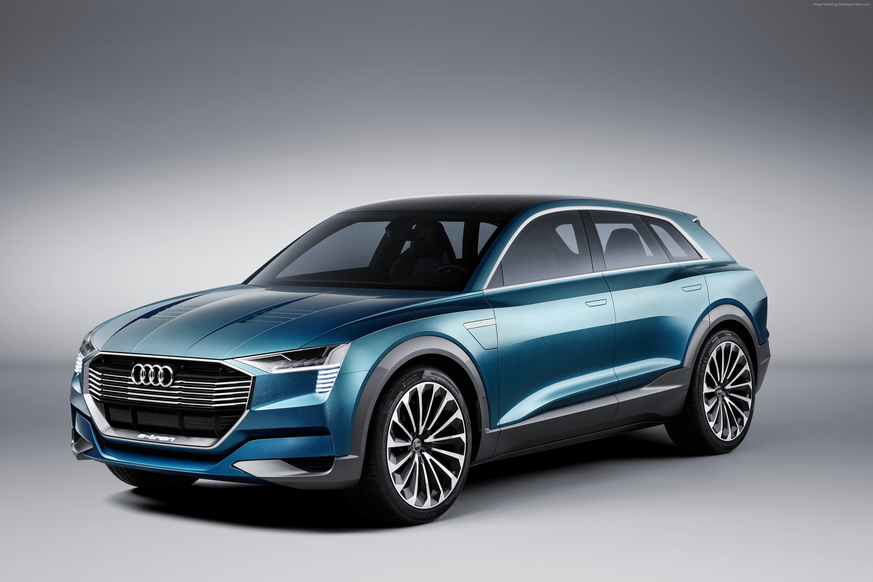 blue Audi sport utility vehicle