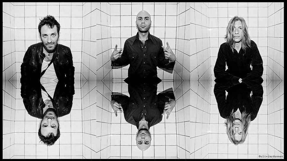 grayscale mirror effect photo of three men in black jackets HD wallpaper