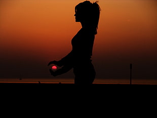 silhouette photography of woman and sun HD wallpaper