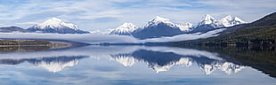 white mountains near body of water during daytime HD wallpaper