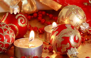 lighted candles near red and brown bauble HD wallpaper