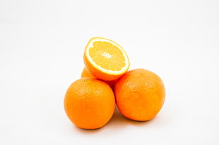 three round orange with sliced fruit HD wallpaper