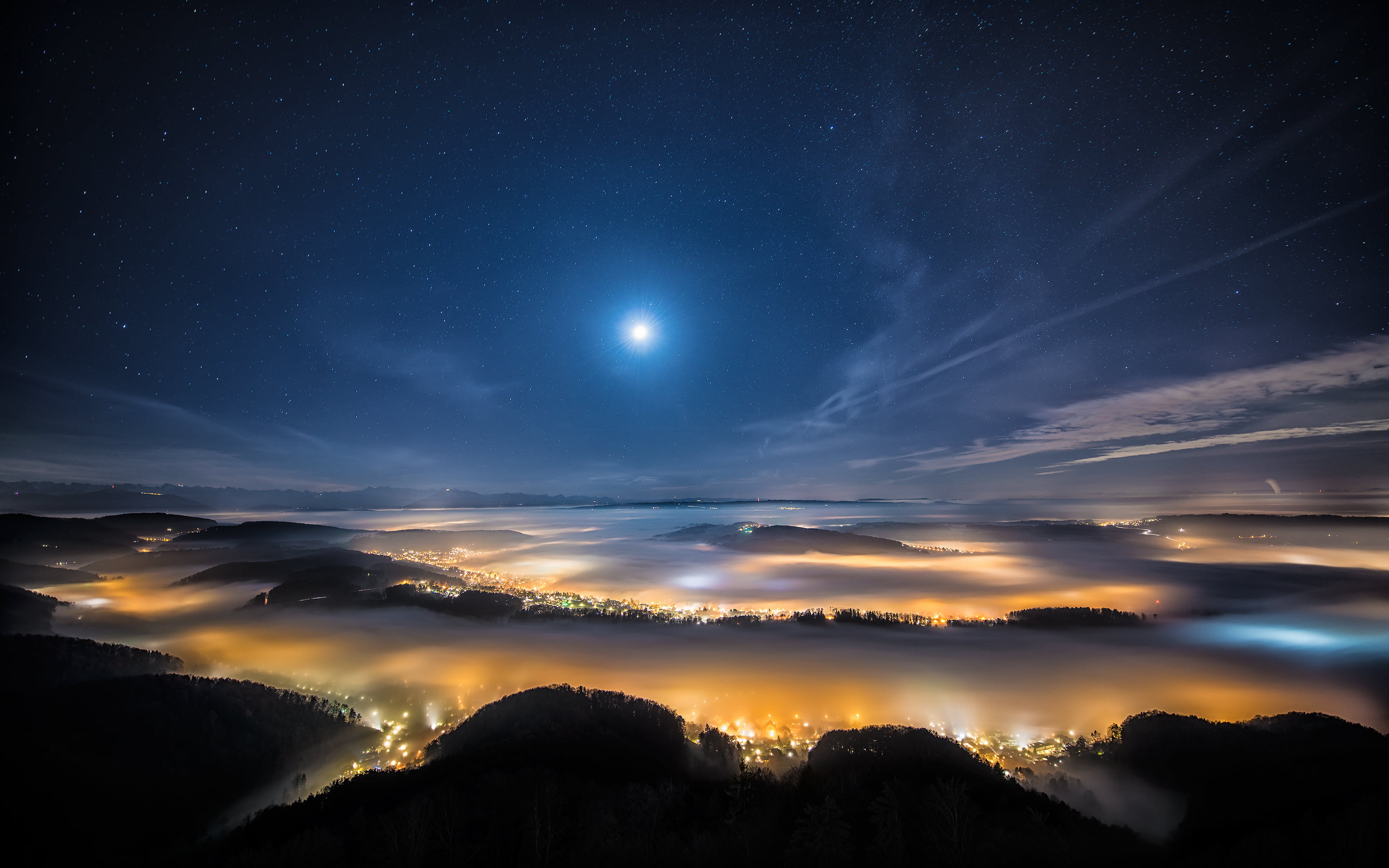 lights near hills at night